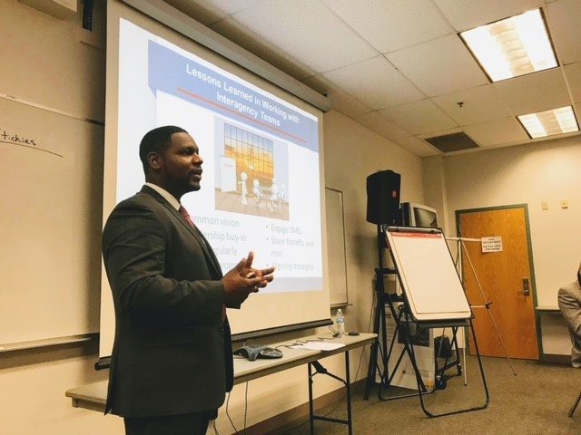 Donald Harris presenting to a group